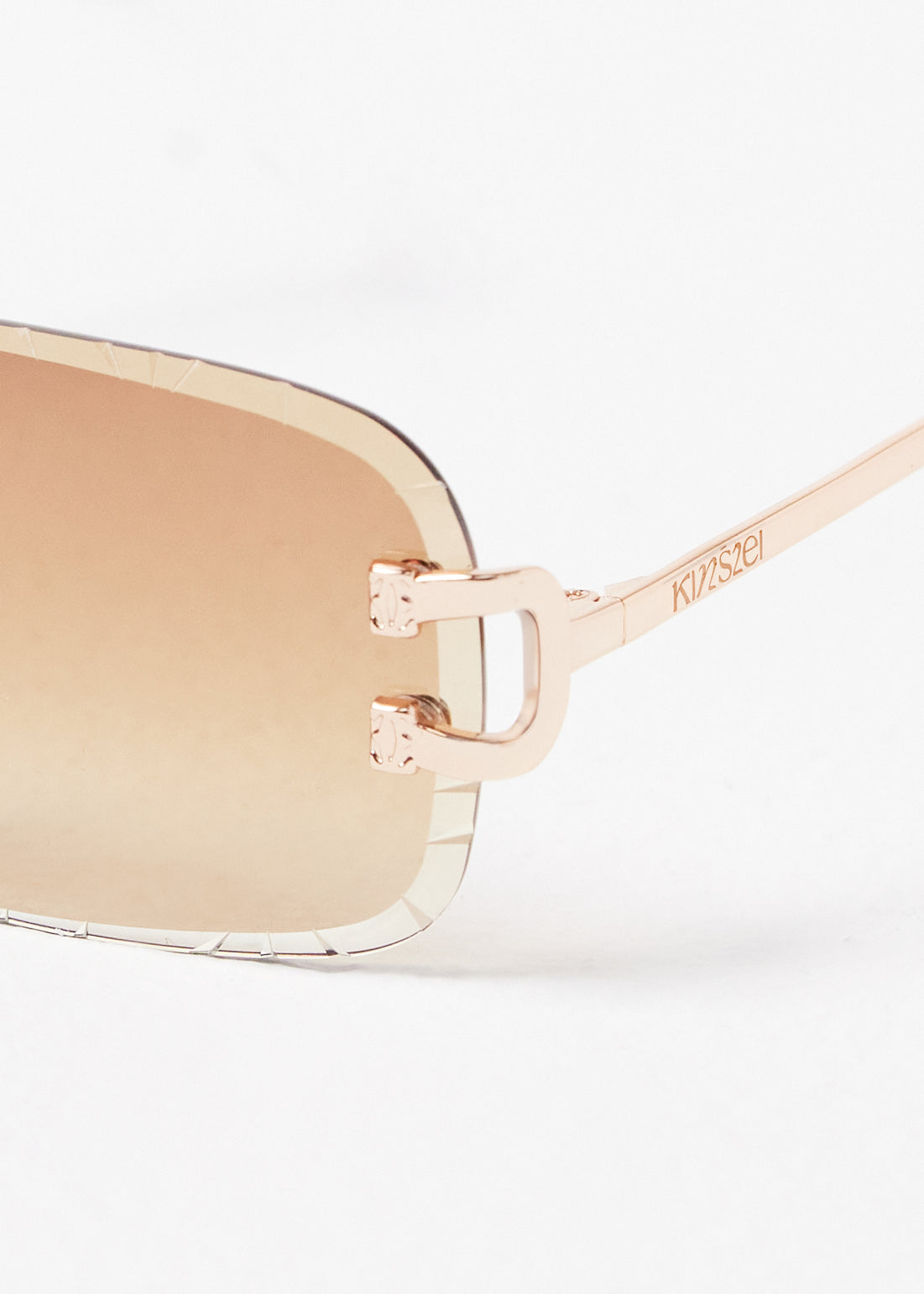 Kinslei Kids Frameless Diamond Cut Sunglasses Champagne